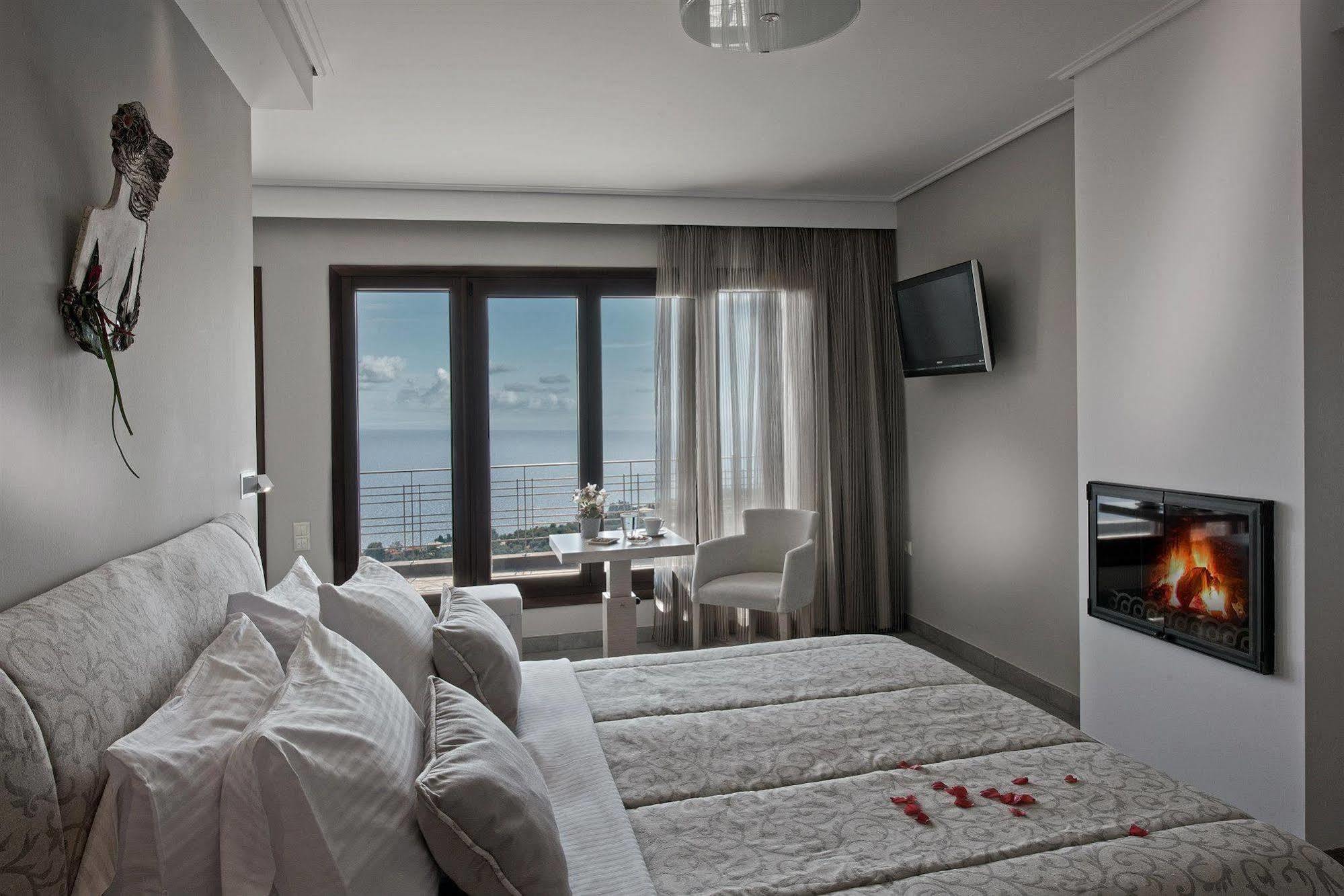 Karavia Lux Inn Афиссос Экстерьер фото